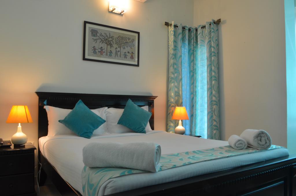 Luxtay Suites Bangalore Bilik gambar